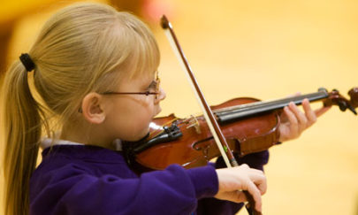 Children playing musical instruments at Sistema Scotland