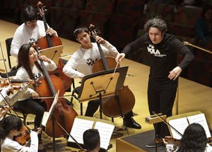 Gustavo Dudamel conducts a performance with YOLA, Youth Orchestra Los Angeles at Walt Disney Concert Hall on May 10, 2014 in Los Angeles. (Lawrence K. Ho/Los Angeles Times/TNS)/ Postbulletin.com